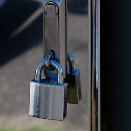 Uplcose view of a padlock.