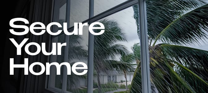 A view of a storm through a window. To the left, the words: Secure Your Home.
