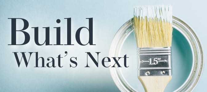 A paint brush resting on top of a paint can. To the left, the words: build what's next.