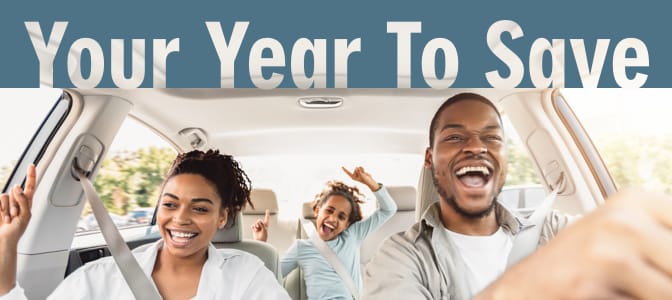 A side view of a white SUV. To the left, the words: drive forward. Cruise in to lower payments.